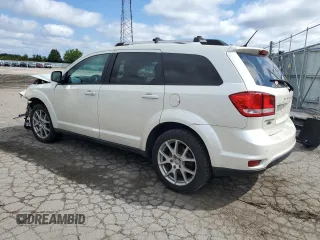 2013 Dodge Journey Crew with VIN 3C4PDCCG3DT643061, listed as a Copart auction lot 67518754 with 154,227 mi miles and Salvage title. Bid and sale history available at DreamBid. Image 2.