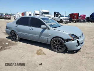 2005 Mitsubishi Lancer ES with VIN JA3AJ26E65U054420, listed as a Copart auction lot 52206935 with 187,277 mi miles and Salvage Title. Bid and sale history available at carsss.com. Image 4.