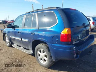 2003 GMC Envoy SLT with VIN 1GKDT13S732268164, listed as a IAAI auction lot 41863800 with 100,702 mi miles. Bid and sale history available at carsss.com. Image 3.