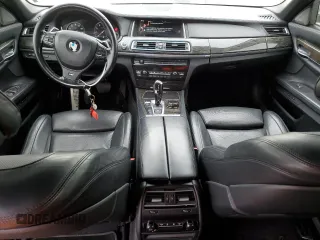 2015 BMW 7 Series 750i z VIN WBAYA8C5XFD825662, wystawiony jako Copart lot #78850474 z przebiegiem 153 080 mil mil oraz Czysty tytuł • Clean title. Historia ofert i sprzedaży dostępna na DreamBid. Obrazek 8.