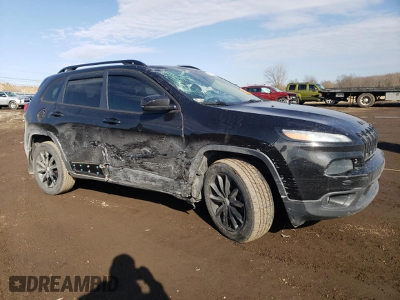 2014 Jeep Cherokee Altitude with VIN 1C4PJMCS0EW291247, listed as a Copart auction lot 47694115 with 124,775 mi miles and Salvage Title. Bid and sale history available at carsss.com. Image 4.