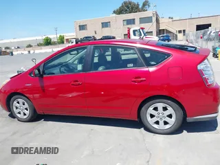 2007 Toyota Prius z VIN JTDKB20U373288946, wystawiony jako IAAI lot #42385536 z przebiegiem 133 336 mil mil oraz . Historia ofert i sprzedaży dostępna na DreamBid. Obrazek 14.