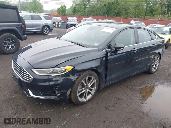 2020 Ford Fusion SEL z VIN 3FA6P0CD9LR183400, wystawiony jako IAAI lot #42271491 z przebiegiem 52 020 mil mil oraz . Historia ofert i sprzedaży dostępna na DreamBid. Obrazek 18.