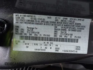 2014 Ford Focus SE with VIN 1FADP3F24EL105899, listed as a IAAI auction lot 41840399 with 90,074 mi miles. Bid and sale history available at carsss.com. Image 9.