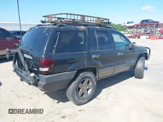 2004 Jeep Grand Cherokee Laredo z VIN 1J4GX48S04C281660, wystawiony jako IAAI lot #42551161 z przebiegiem 173 209 mil mil oraz . Historia ofert i sprzedaży dostępna na DreamBid. Obrazek 4.