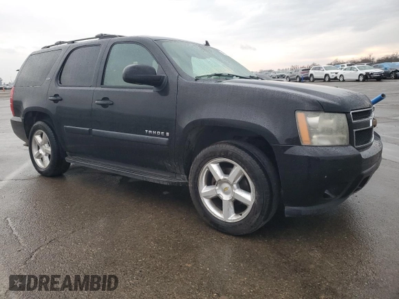 2007 Chevrolet Tahoe LTZ with VIN 1GNFC13067R267773, listed as a Copart auction lot 41653905 with 197,538 mi miles and Salvage title. Bid and sale history available at DreamBid. Image 4.