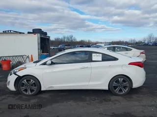 2013 Hyundai Elantra GS z VIN KMHDH6AE3DU004609, wystawiony jako IAAI lot #41738554 z przebiegiem 108 586 mil mil oraz . Historia ofert i sprzedaży dostępna na DreamBid. Obrazek 14.
