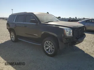 2017 GMC Yukon SLE with VIN 1GKS2AKC9HR403504, listed as a Copart auction lot 73595964 with 73,530 mi miles and Salvage Title. Bid and sale history available at carsss.com. Image 4.