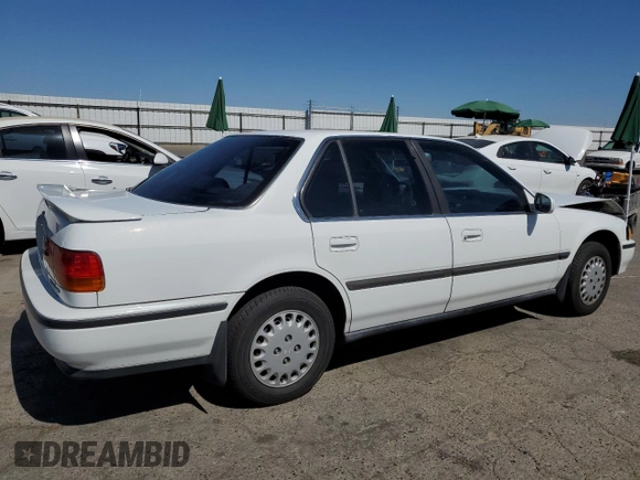 1993 Honda Accord with VIN 1HGCB7653PA144604, listed as a Copart auction lot 60893475 with 149,170 mi miles and Salvage title. Bid and sale history available at DreamBid. Image 3.