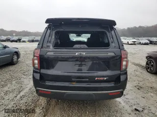 2021 Chevrolet Suburban RST with VIN 1GNSKEKD4MR210450, listed as a Copart auction lot 84372054 with 98,560 mi miles and Salvage Title. Bid and sale history available at carsss.com. Image 6.