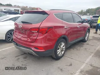 2017 Hyundai Santa Fe Sport 2.0T with VIN 5XYZU4LA9HG406663, listed as a IAAI auction lot 40908199 with 140,696 mi miles. Bid and sale history available at carsss.com. Image 4.