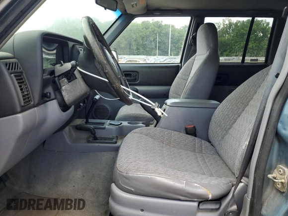 1998 Jeep Cherokee Sport with VIN 1J4FJ68S6WL215447, listed as a Copart auction lot 65186505 with 177,682 mi miles and Clean title. Bid and sale history available at DreamBid. Image 7.
