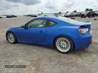 2014 Subaru BRZ Limited with VIN JF1ZCAC17E9600385, listed as a Copart auction lot 52814065 with 122,773 mi miles and Salvage title. Bid and sale history available at DreamBid. Image 2.