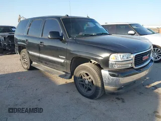 2005 GMC Yukon SLT with VIN 1GKEC13T85R126283, listed as a IAAI auction lot 41777710 with 200,163 mi miles. Bid and sale history available at carsss.com. Image 1.