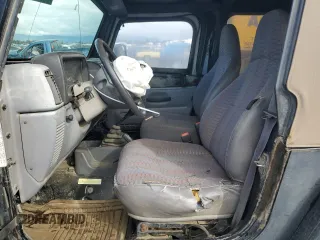 1998 Jeep Wrangler Sport with VIN 1J4FY19S5WP717503, listed as a Copart auction lot 49188195 with 180,717 mi miles and Salvage Title. Bid and sale history available at carsss.com. Image 7.