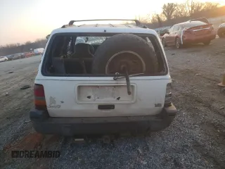 1993 Jeep Grand Cherokee Laredo with VIN 1J4GZ58Y9PC677532, listed as a Copart auction lot 44391245 with 178,772 mi miles and Salvage Title. Bid and sale history available at carsss.com. Image 6.