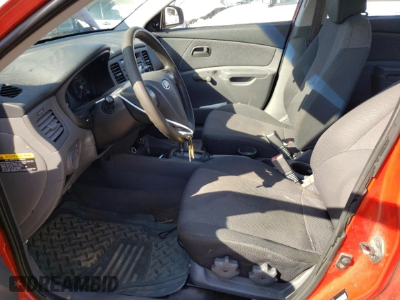 2007 Kia Rio LX with VIN KNADE123976204896, listed as a Copart auction lot 63579683 with 212,296 mi miles and Salvage Title. Bid and sale history available at carsss.com. Image 7.