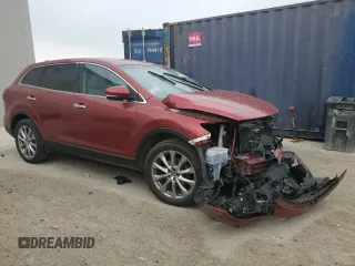 2014 Mazda CX-9 Grand Touring с VIN JM3TB3DA6E0441772, выставлен на аукционе Copart как лот 60832875 с пробегом Не указан миль и На запчасти • Non repairable. История ставок и продаж доступна на DreamBid. Изображение 4.