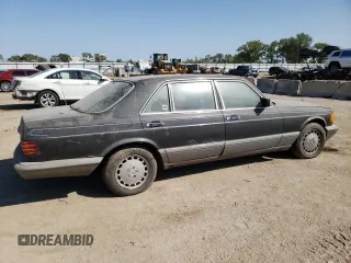 1988 Mercedes-Benz 560 with VIN WDBCA39D0JA401107, listed as a Copart auction lot 70535804 with 328,561 mi miles and Clean Title. Bid and sale history available at DreamBid. Image 3.