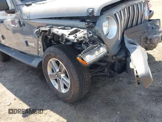 2022 Jeep Wrangler Unlimited Sahara with VIN 1C4HJXEM7NW206585, listed as a IAAI auction lot 42102516 with 10,769 mi miles and . Bid and sale history available at DreamBid. Image 20.