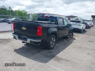 2018 Chevrolet Colorado 4WD Work Truck z VIN 1GCGTBEN9J1206595, wystawiony jako IAAI lot #42150736 z przebiegiem 176 880 mil mil oraz . Historia ofert i sprzedaży dostępna na DreamBid. Obrazek 4.