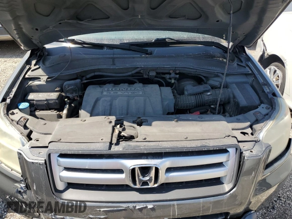 2008 Honda Pilot EX-L z VIN 5FNYF18758B031962, wystawiony jako Copart lot #69118424 z przebiegiem 168 215 mil mil oraz Szkoda całkowita • Salvage title. Historia ofert i sprzedaży dostępna na DreamBid. Obrazek 11.