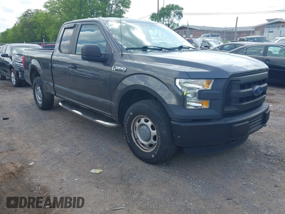 2015 Ford F-150 XLT with VIN 1FTEX1E89FKD84587, listed as a IAAI auction lot 42102545 with 141,265 mi miles. Bid and sale history available at carsss.com. Image 1.