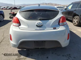 2015 Hyundai Veloster z VIN KMHTC6ADXFU222793, wystawiony jako Copart lot #57861415 z przebiegiem 98 318 mil mil oraz Szkoda całkowita • Salvage title. Historia ofert i sprzedaży dostępna na DreamBid. Obrazek 6.