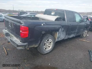 2014 Chevrolet Silverado 1500 LT with VIN 1GCRCRECXEZ297304, listed as a IAAI auction lot 40954344 with 185,323 mi miles. Bid and sale history available at carsss.com. Image 4.
