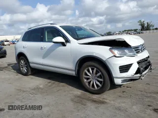 2017 Volkswagen Touareg Sport with VIN WVGEF7BP0HD006792, listed as a Copart auction lot 47895813 with 52,432 mi miles and . Bid and sale history available at DreamBid. Image 4.