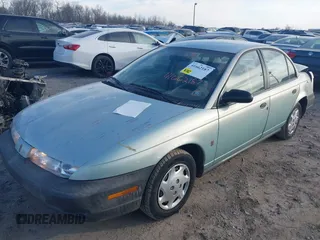 1997 Saturn SL with VIN 1G8ZH528XVZ196784, listed as a IAAI auction lot 41662187 with 112,278 mi miles. Bid and sale history available at carsss.com. Image 17.