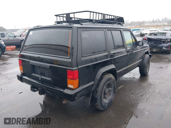 1996 Jeep Cherokee SE with VIN 1J4FJ28S9TL135564, listed as a IAAI auction lot 41618367 with 249,410 mi miles and . Bid and sale history available at DreamBid. Image 4.