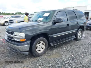 2004 Chevrolet Tahoe LT with VIN 1GNEC13Z04R103506, listed as a IAAI auction lot 42512048 with 197,840 mi miles and . Bid and sale history available at DreamBid. Image 2.