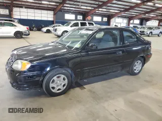 2005 Hyundai Accent GLS with VIN KMHCG35C95U327960, listed as a Copart auction lot 77151314 with 101,556 mi miles and Clean Title. Bid and sale history available at carsss.com. Image 1.
