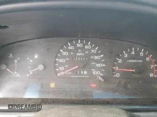 1997 Nissan Frontier XE with VIN 1N6SD16S8VC426940, listed as a Copart auction lot 55860235 with 242,265 mi miles and Salvage title. Bid and sale history available at DreamBid. Image 9.