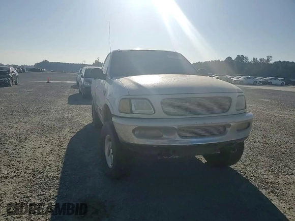 1998 Ford F-150 with VIN 1FTZF18W3WNB98041, listed as a Copart auction lot 77530824 with 194,712 mi miles and Salvage title. Bid and sale history available at DreamBid. Image 11.