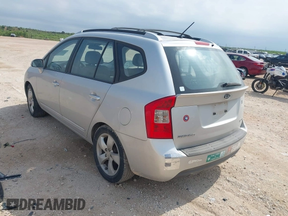 2007 Kia Rondo LX with VIN KNAFG526077069189, listed as a IAAI auction lot 42090474 with 96,722 mi miles. Bid and sale history available at carsss.com. Image 3.