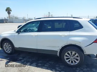 2019 Volkswagen Tiguan S with VIN 3VV1B7AX1KM101407, listed as a IAAI auction lot 42032761 with 51,868 mi miles and . Bid and sale history available at DreamBid. Image 14.