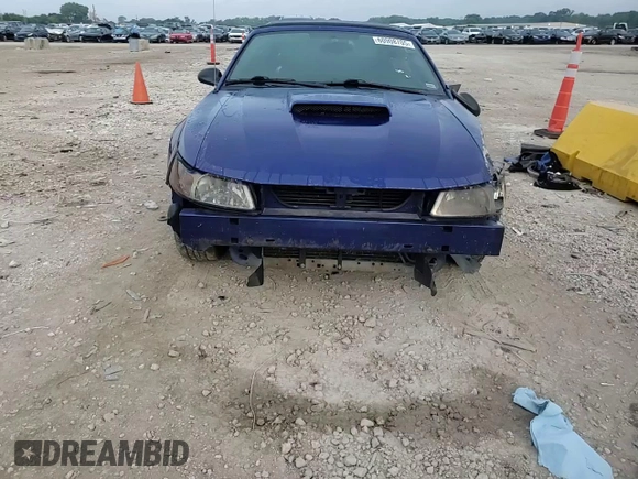 2004 Ford Mustang Deluxe with VIN 1FAFP444X4F107575, listed as a Copart auction lot 60908705 with 148,467 mi miles and Salvage title. Bid and sale history available at DreamBid. Image 13.