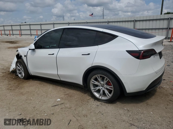 2021 Tesla Model Y Long Range with VIN 5YJYGDEE5MF203130, listed as a Copart auction lot 54642795 with 73,663 mi miles and Non Repairable. Bid and sale history available at DreamBid. Image 2.