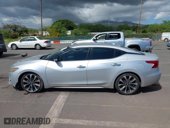 2016 Nissan Maxima SV with VIN 1N4AA6AP5GC395274, listed as a IAAI auction lot 41616698 with 102,736 mi miles and . Bid and sale history available at DreamBid. Image 14.