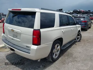 2015 Chevrolet Tahoe LT with VIN 1GNSCBKC0FR739951, listed as a IAAI auction lot 42332982 with 133,046 mi miles and . Bid and sale history available at DreamBid. Image 4.