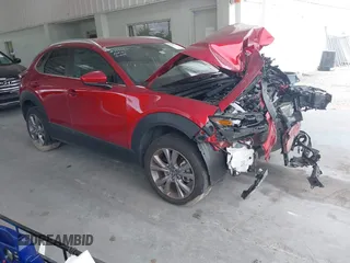 2023 Mazda CX-30 S Carbon Edition with VIN 3MVDMBCM3PM537841, listed as a IAAI auction lot 42080487 with 22,718 mi miles and . Bid and sale history available at DreamBid. Image 1.