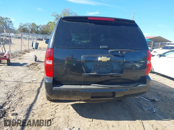 2013 Chevrolet Tahoe Commercial with VIN 1GNLC2E05DR266048, listed as a IAAI auction lot 40848505 with 95,459 mi miles and . Bid and sale history available at DreamBid. Image 16.
