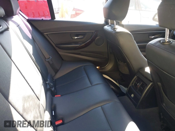 2015 BMW 3 Series 328i with VIN WBA3C1C53FK120984, listed as a IAAI auction lot 41338035 with 119,486 mi miles and . Bid and sale history available at carsss.com. Image 8.