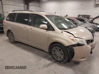 2014 Toyota Sienna XLE with VIN 5TDYK3DC0ES491208, listed as a IAAI auction lot 41389866 with 213,230 mi miles. Bid and sale history available at carsss.com. Image 1.