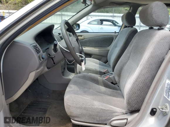 1999 Toyota Corolla VE with VIN 2T1BR12E4XC253867, listed as a Copart auction lot 63768395 with 164,195 mi miles and Salvage title. Bid and sale history available at DreamBid. Image 7.