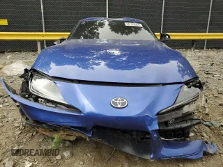 2023 Toyota GR Supra 3.0 with VIN WZ1DB0G02PW060680, listed as a Copart auction lot 66189084 with 0 mi miles and Salvage Title. Bid and sale history available at carsss.com. Image 5.