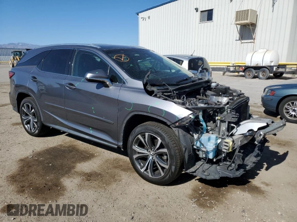 2019 Lexus RX 350L Premium with VIN JTJDZKCA8K2018841, listed as a Copart auction lot 54181935 with 107,276 mi miles and Salvage title. Bid and sale history available at DreamBid. Image 4.
