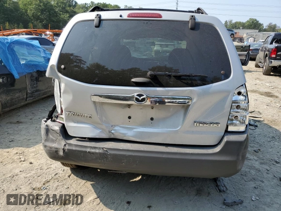 2003 Mazda Tribute DX with VIN 4F2YZ02B83KM52472, listed as a Copart auction lot 68642804 with 179,193 mi miles and Salvage Title. Bid and sale history available at carsss.com. Image 6.